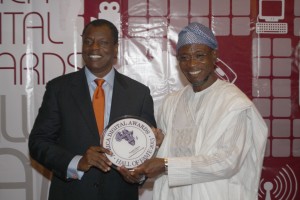 Austin Okere receiving Africa Digital Hall of Fame award from Gov Rauf Aregbesola
